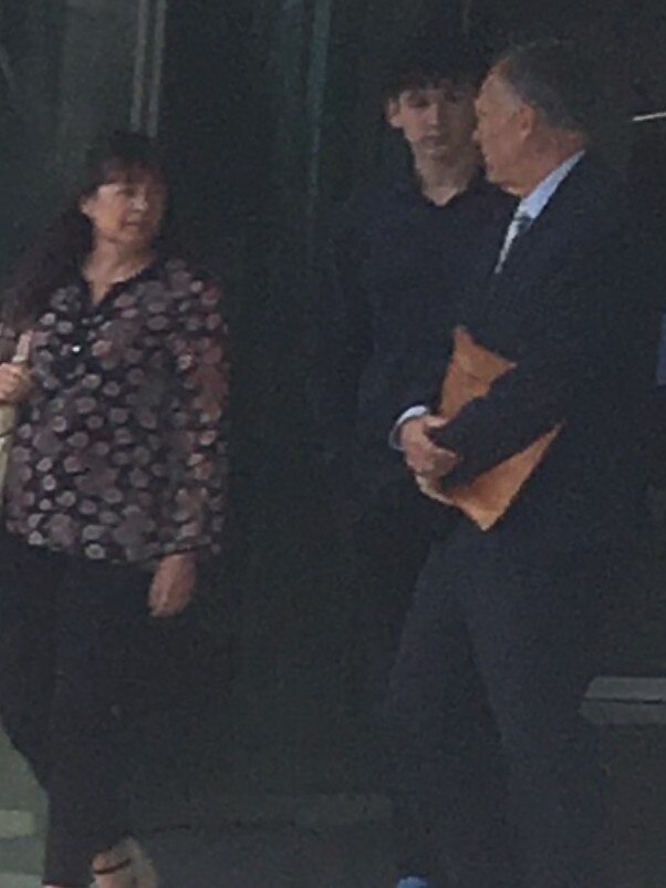 Alexander Ellis MacMillan (centre) leaves Coffs Harbour Local Court.