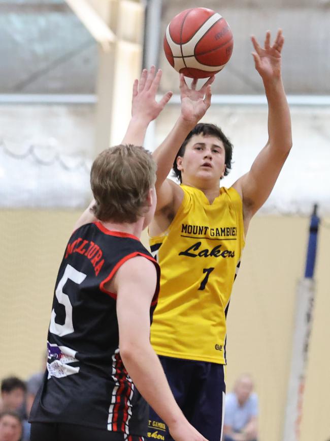Mount Gambier’s Sam Lock shoots a three point during the under-18 boys division one SA Country Basketball Championships at Wayville on Monday. Picture: Kelly Barnes/AllStar Photos