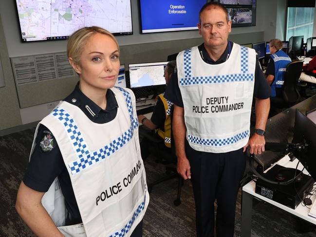 Family Violence Commanders Acting Superintendent Holly Dalrymple and Inspector Steve McRae in the command centre. Picture: David Caird