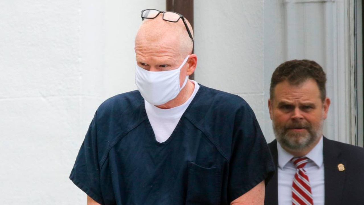 Alex Murdaugh is escorted out of the Colleton County Courthouse in Walterboro on Wednesday, July 20, 2022, after pleading not guilty and being denied bond hearing on charges of murdering his wife and son. (Tracy Glantz/The State/Tribune News Service via Getty Images)