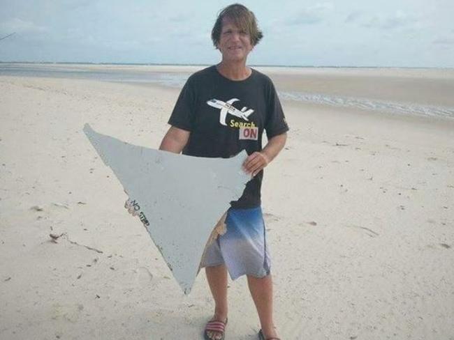 American adventurer and MH370 sleuth Blaine Gibson with his ‘NO STEP’ piece, which formed part of the horizontal stabiliser of a Boeing 777. Picture: Blaine A Gibson