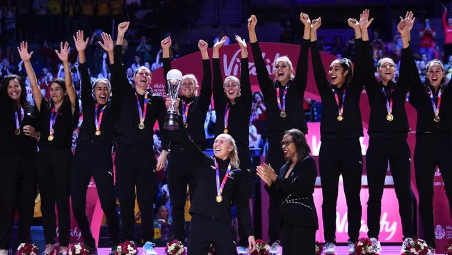 The Silver Ferns collect their World Cup winners medals. Picture: Getty Images