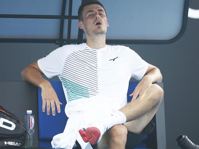 An exhausted Tomic comes to terms with the difficult breathing conditions.