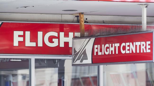 Flight Centre shopfronts in Hobart closed early on in the pandemic.