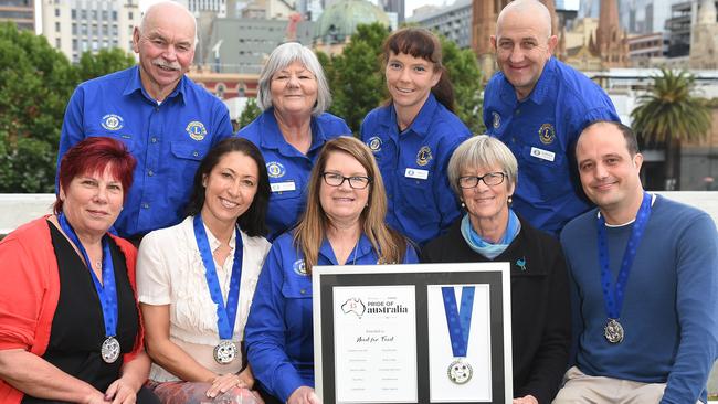 Darren Laffan with others at the Pride of Australia State Medal Ceremony for his Need for Feed work. Picture: Josie Hayden