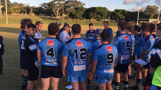 Marymount College players listen to coach Jason Hamilton.