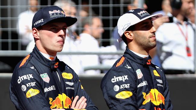 AUSTIN, TX - OCTOBER 22: Daniel Ricciardo of Australia and Red Bull Racing and Max Verstappen of Netherlands and Red Bull Racing on the grid before the United States Formula One Grand Prix at Circuit of The Americas on October 22, 2017 in Austin, Texas. Mark Thompson/Getty Images/AFP == FOR NEWSPAPERS, INTERNET, TELCOS &amp; TELEVISION USE ONLY ==