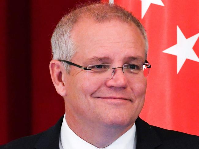 Australia’s Prime Minister Scott Morrison speaks at a joint press conference with Singapore's Prime Minister Lee Hsien Loong (not pictured) at the Istana Presidential Palace in Singapore on June 7, 2019. (Photo by Roslan RAHMAN / AFP)