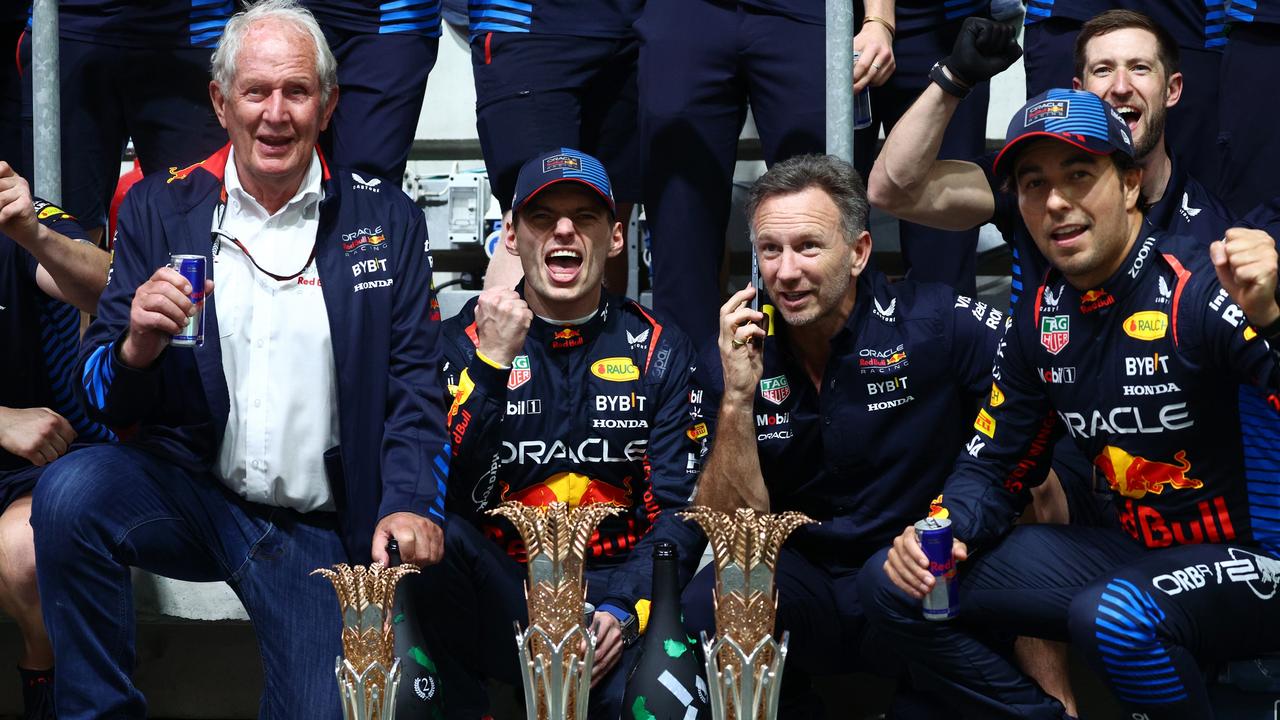 Dr Helmut Marko, Max Verstappen, Christian Horner and Sergio Perez. Photo by Clive Rose/Getty Images.