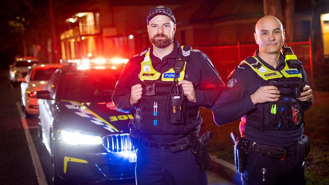 Acting Sergeant Adam Mizzi and First Constable Matt Parsons are part of Operation Achilles. Picture: Mark Stewart