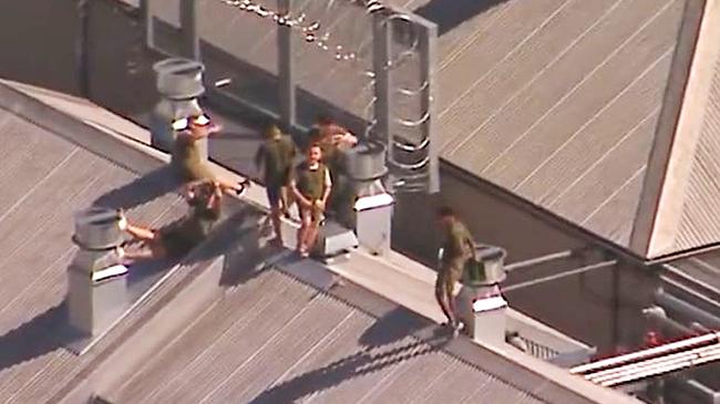 Channel 9 helicopter footage of prisoners on the roof at Borallon Training and Correctional Centre.