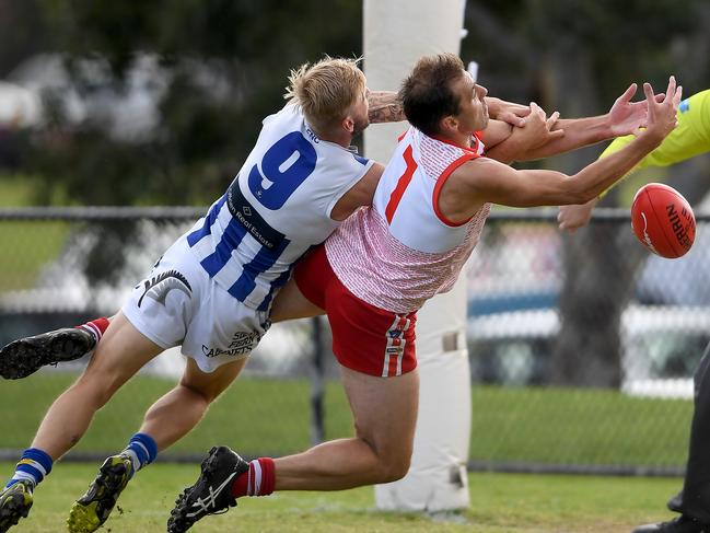 Shane Paterson and Lucas Vanraay in action during the MPNFL Division 2: Karingal v Langwarrin football match in Frankston, Saturday, May 4, 2019. Picture: Andy Brownbill