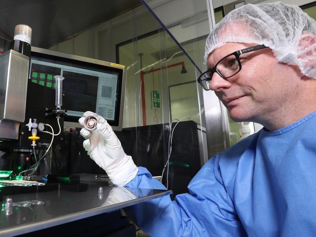 Angus Forster, Vaxxas chief development and operations officer, in a lab at the Translational Research Institute . Pic Annette Dew