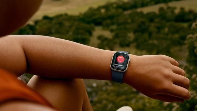 Lexie Northcott receives a heart rate notification on her Apple Watch.