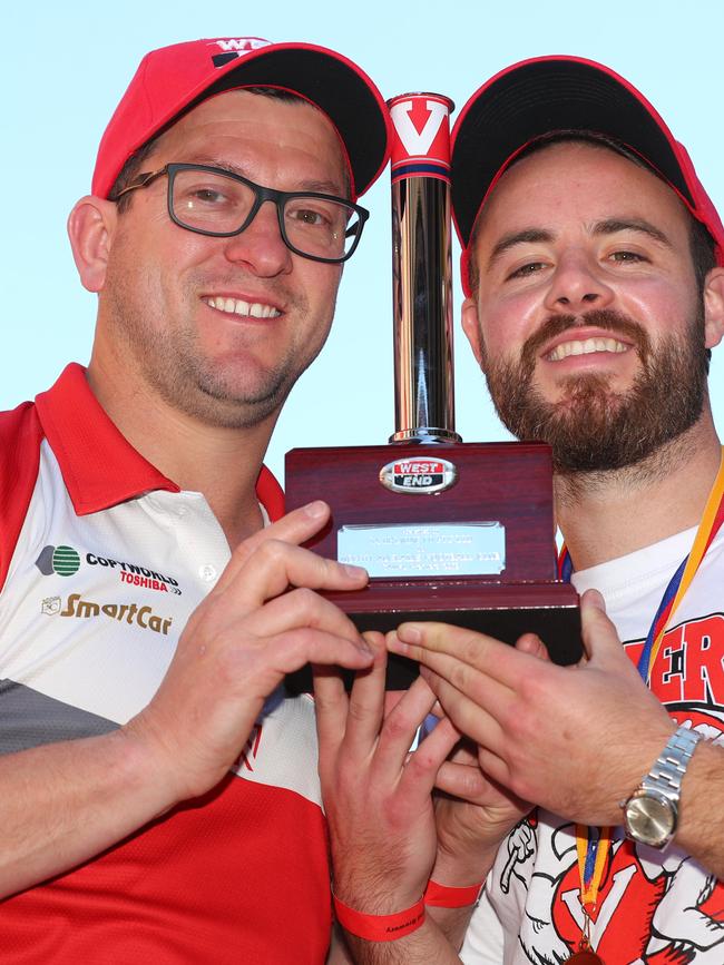 North Adelaide coach Josh Carr and North Adelaide captain Max Thring with a replica of the chimney at yesterday’s ceremony. Picture: Tait Schmaal