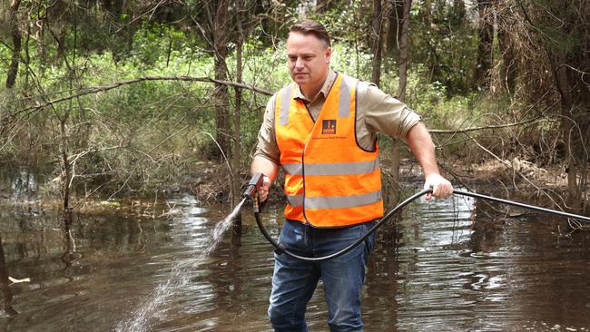 Lord Mayor Adrian Schrinner at flood-hit Bald Hills. He is calling on the Government to pause or rethink valuations for affected suburbs. Picture: Liam Kidston