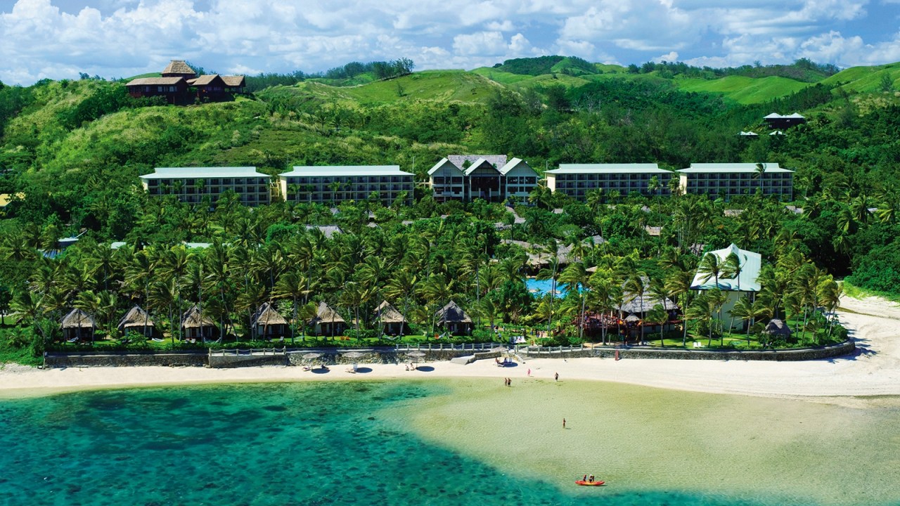 <h2><span>Outrigger Fiji Beach Resort</span></h2><p><span>This property has long been a favourite of Aussies who want a combo of luxe and value. This isn&rsquo;t an all-inclusive package per se but what you do get is early check in and/or check out, a bottle of wine on arrival, two for one 60 minute spa treatments if you&rsquo;re staying more than six nights and, here&rsquo;s the real draw, free meals for up to four children aged three to 12 if you&rsquo;re staying for more than four nights.</span></p><p class="button-common"><a title="https://luxuryescapes.sjv.io/c/1325532/1936432/23356?subId1=ESC--evergreen--&amp;u=https%3A%2F%2Fluxuryescapes.com%2Fau%2Foffer%2Foutrigger-fiji-beach-resort-fiji%2F0062y000004SYj8AAG" href="https://luxuryescapes.sjv.io/c/1325532/1936432/23356?subId1=ESC--evergreen--&amp;u=https%3A%2F%2Fluxuryescapes.com%2Fau%2Foffer%2Foutrigger-fiji-beach-resort-fiji%2F0062y000004SYj8AAG" target="_blank" data-cta="https://luxuryescapes.sjv.io/c/1325532/1936432/23356?subId1=ESC--evergreen--&amp;u=https%3A%2F%2Fluxuryescapes.com%2Fau%2Foffer%2Foutrigger-fiji-beach-resort-fiji%2F0062y000004SYj8AAG" data-editable="true">Book here</a></p>