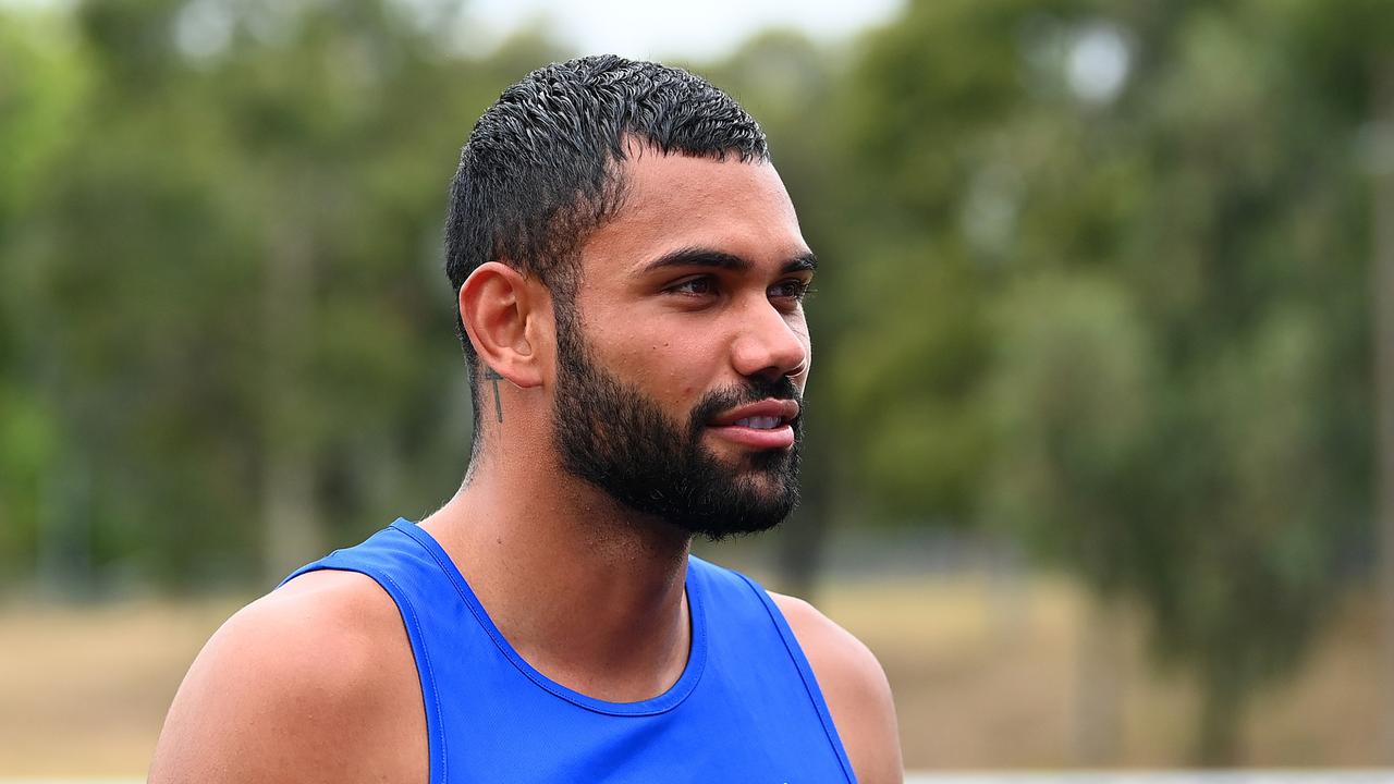 MELBOURNE, AUSTRALIA – FEBRUARY 27: Tarryn Thomas of the Kangaroos walks off the training track with his teammates during a North Melbourne Kangaroos AFL media opportunity at Arden Street Ground on February 27, 2023 in Melbourne, Australia. Picture: Quinn Rooney / Getty Images