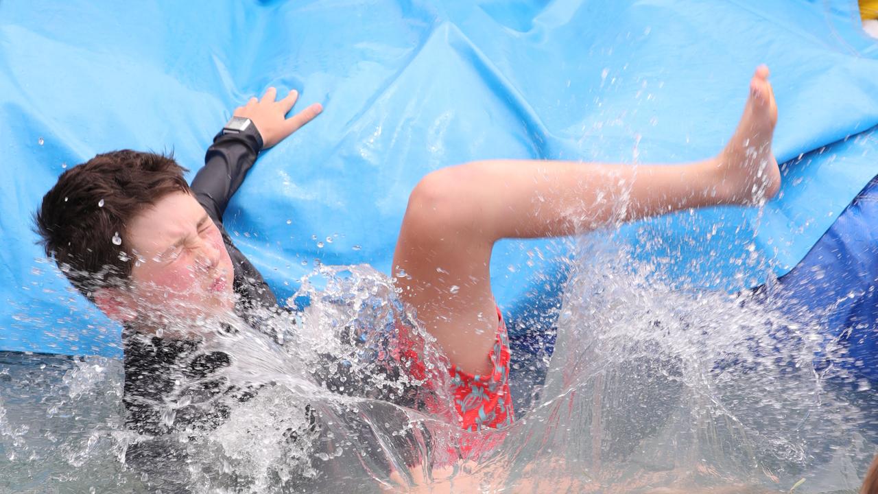 Xavier on the water slide. Picture: Mark Wilson.