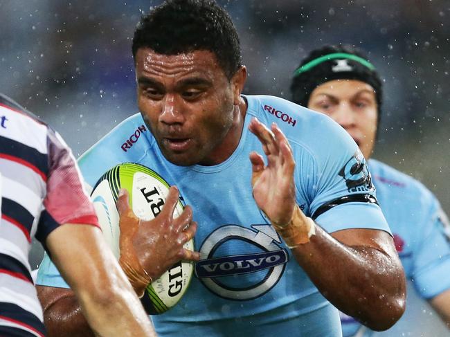 SYDNEY, AUSTRALIA - APRIL 25: Wycliff Palu of the Waratahs takes on the defence during the round 11 Super Rugby match between the Waratahs and the Rebels at ANZ Stadium on April 25, 2015 in Sydney, Australia. (Photo by Matt King/Getty Images)