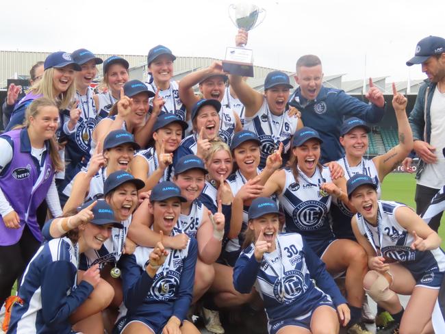 Old Launcestonians celebrate with the silverware after claiming their maiden NTFA premier women's flag in Saturday's grand final against Bridgenorth. Picture: Jon Tuxworth