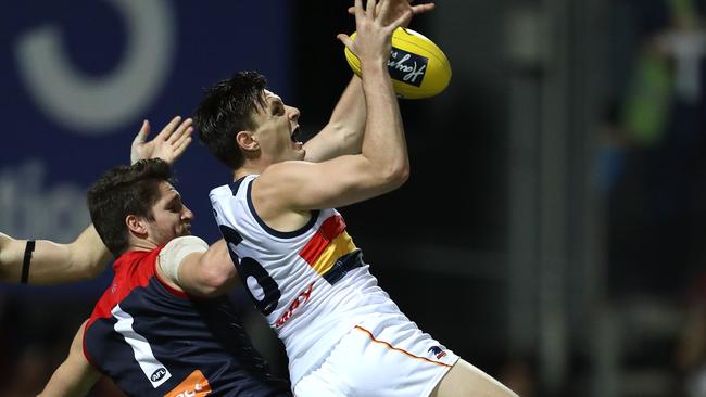 Lever takes a mark against the Demons, one of the clubs chasing his signature. Picture: Getty Images