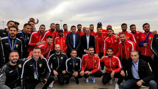 Jordan's Prince Ali bin Hussein (C), half-brother of the king and President of the Jordan Football Association, poses for a group picture with the national team players upon their return from the Qatar 2023 AFC Asian Cup final. Picture: Khalil Mazraawi/AFP