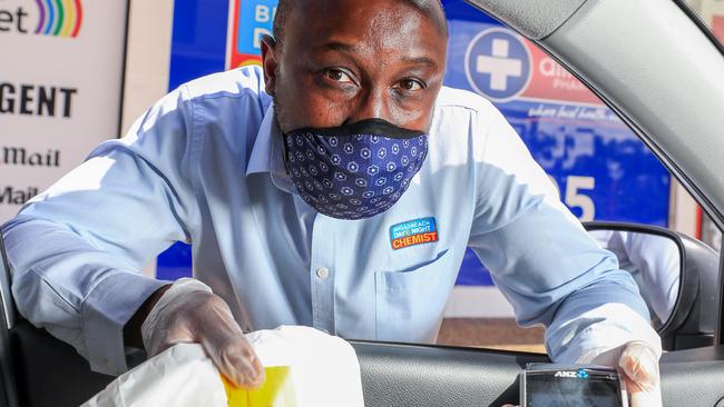 Broadbeach Day and Night Chemist Chris Mazarire will dispense directly to your car, aware of social distancing. Picture: Tim Marsden.