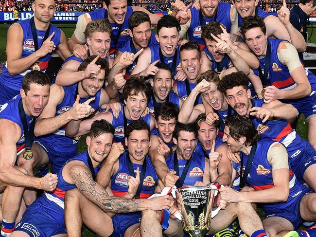 Bulldogs player reacts after winning the AFL Grand Final between the Sydney Swans and the Western Bulldogs at the MCG in Melbourne, Saturday, Oct. 1, 2016. (AAP Image/Julian Smith) NO ARCHIVING, EDITORIAL USE ONLY