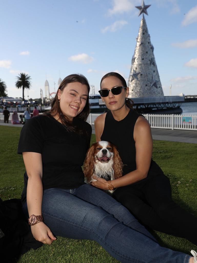 Gabrielle and Kelly Romeyn with Franklin. Locals and visitors arrived early to get a good spot for the Geelong New Years Eve celebrations. Picture: Alan Barber