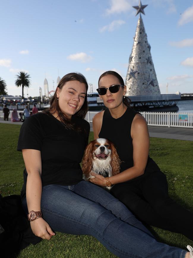 Gabrielle and Kelly Romeyn with Franklin. Locals and visitors arrived early to get a good spot for the Geelong New Years Eve celebrations. Picture: Alan Barber