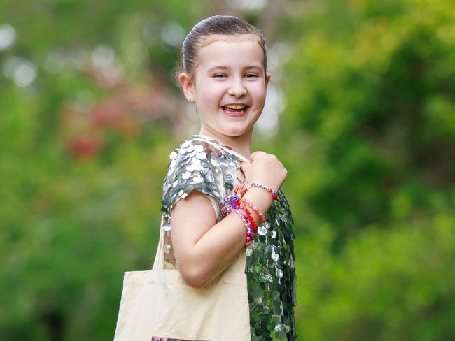 Daily Telegraph. 20, February, 2024.Zara Bryan-Mathieson, 9, celebrates her Taylor Swift tickets, at home in Turramurra, today. Thanks to Starlight, she will attend Taylor Swift's show in Sydney on Saturday night.Picture: Justin Lloyd.