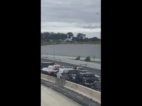 Driver arrested as bizarre Gold Coast police chase comes to dramatic end