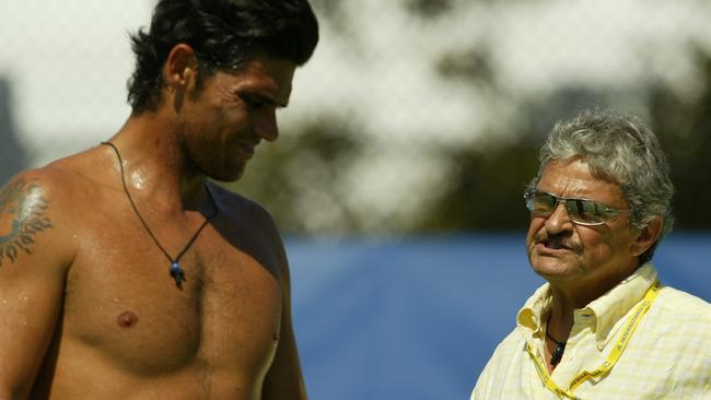 Mark Philippoussis pictured with his father Nick during a training session in 2004.