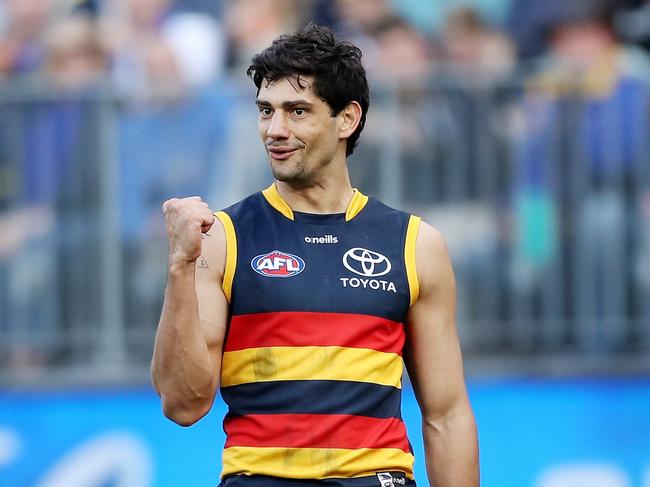 PERTH, AUSTRALIA - AUGUST 07: Shane McAdam of the Crows celebrates after scoring a goal during the 2022 AFL Round 21 match between the West Coast Eagles and the Adelaide Crows at Optus Stadium on August 7, 2022 in Perth, Australia. (Photo by Will Russell/AFL Photos via Getty Images)