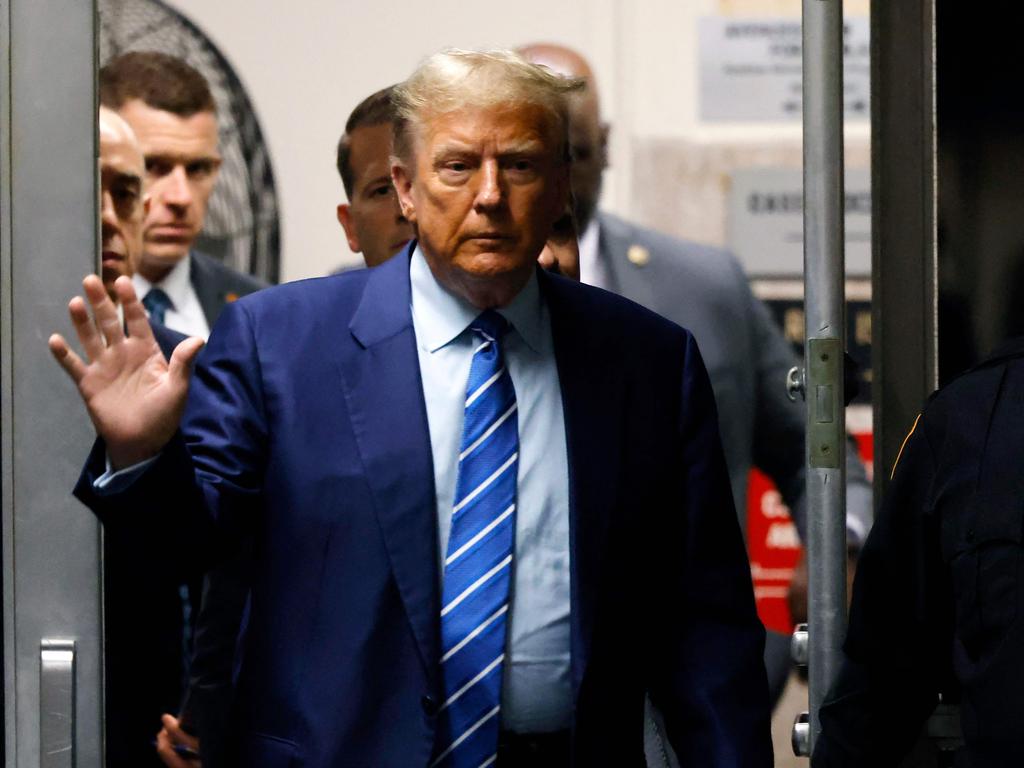 Donald Trump arrives at the courtroom as jury selection continues. Picture: Michael Santiago (AFP)