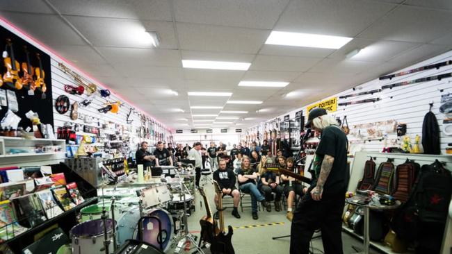 Sabian Lynch of Alpha Wolf holds a guitar clinic at Fosters Music Burnie on Thursday December 12. Picture: Supplied