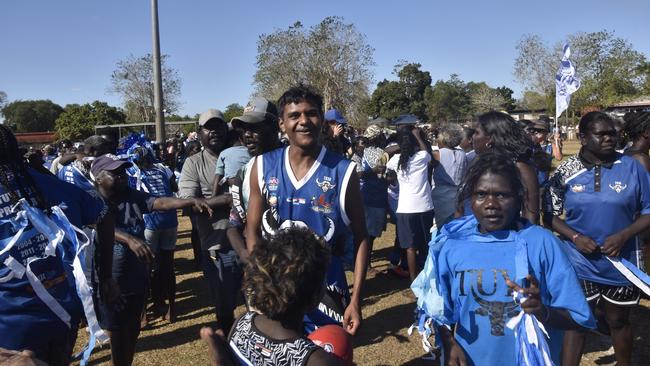 The Buffaloes celebrating in the Tiwi Island Football League grand final between Tuyu Buffaloes and Pumarali Thunder. Picture: Max Hatzoglou