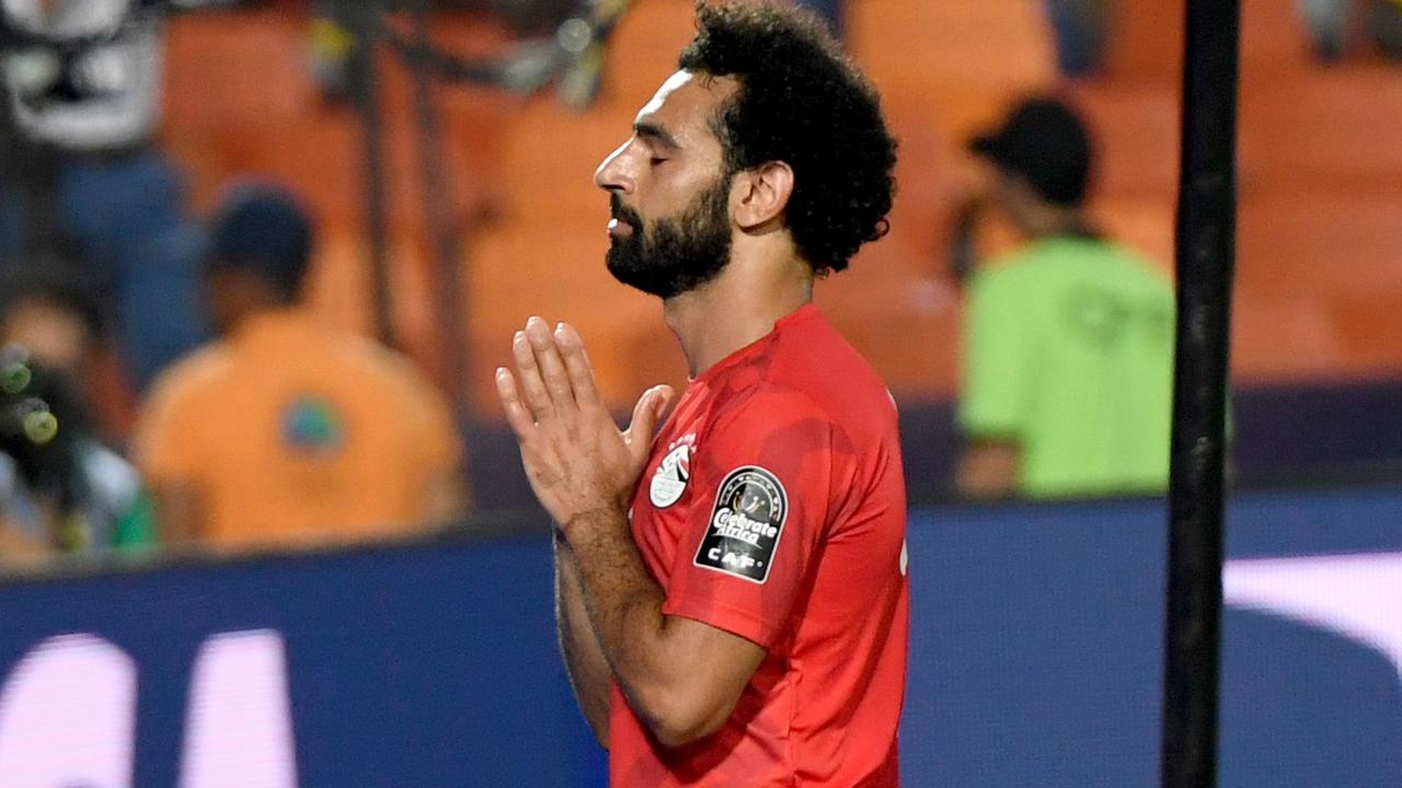 Salah celebrates after scoring Egypt’s second goal in win over DR Congo.
