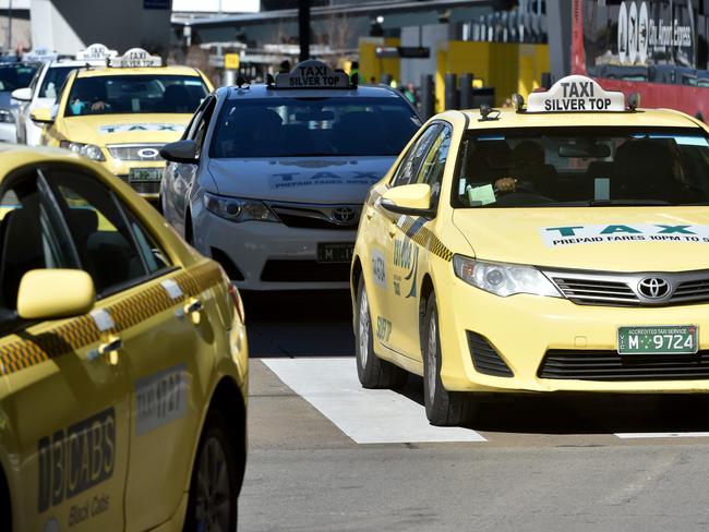 Reporters Aneeka Simonis and Tamsin Rose test drive a Taxi and an Uber trip from Tullamarine. The Taxis heading to the rank.Picture: Jay Town