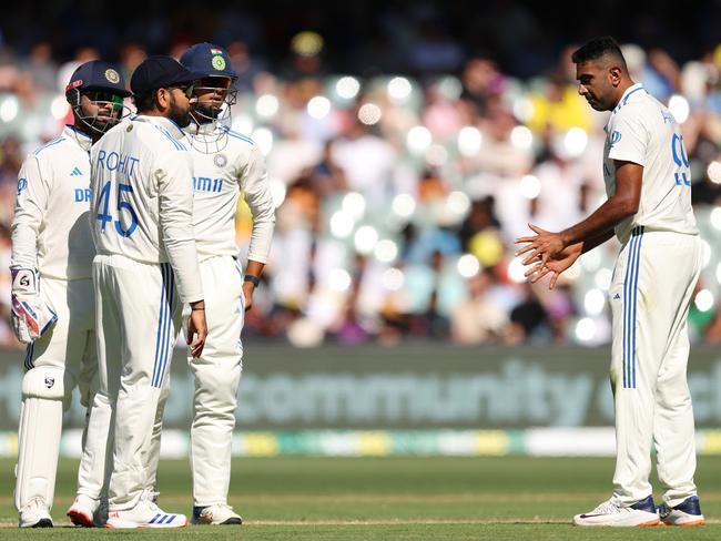 Ravichandran Ashwin asks captain Rohit Sharma to review an LBW appeal. Picture: Getty