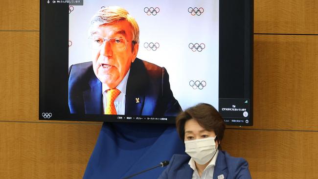 International Olympic Committee (IOC) president Thomas Bach (on screen) delivers an opening speech at a meeting of the IOC Coordination Commission for the Tokyo 2020 Olympics, while Tokyo 2020 Olympics organising committee president Seiko Hashimoto listens. Picture: Yoshikazu Tsuno/Pool/AFP