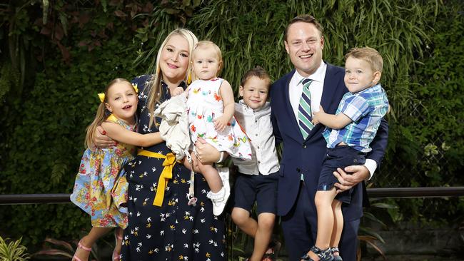 Adrian and Nina Schrinner with children Octavia, 6, Wolfgang, 4, Monash, 2, and Petra, 1, outside Brisbane City Hall on Sunday.