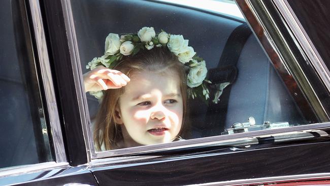 Princess Charlotte, possibly praying for a Maccas run on the way home. Picture: Getty