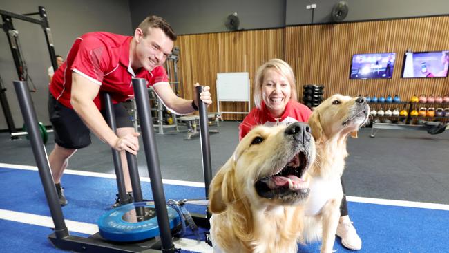 Jackson Kleinschmidt Head Coach with Rachel Sykes Fitness Manager, and dogs Bentley &amp; Boston (smaller one) are the new Pawsonal Trainers, Local gym members get personal training with a furry twist, at the refurbished Genesis Health + Fitness Lawnton, Friday 22nd March 2024- Photo Steve Pohlner