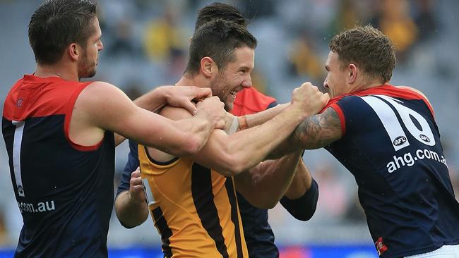 Demons players catch up with former teammate James Frawley.