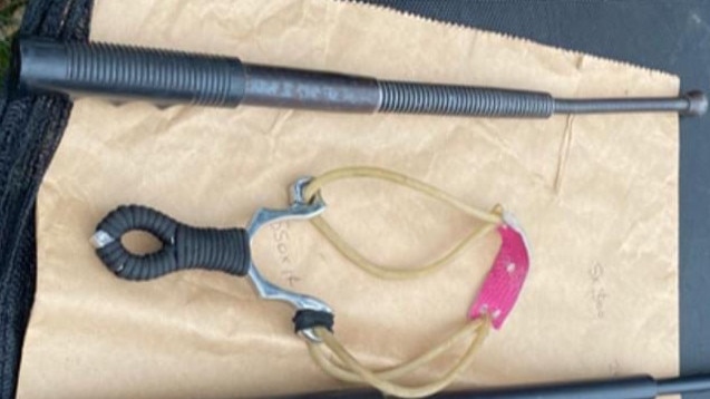 A baton and slingshot allegedly found at Fitzgerald’s property. Picture: supplied