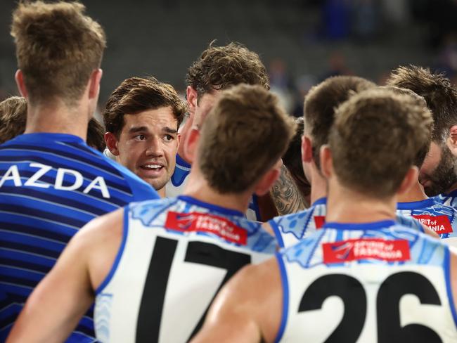 MELBOURNE, AUSTRALIA - MAY 24: Jy Simpkin of the Kangaroos addresses the team during the 2025 AFL Round 11 match between the North Melbourne Kangaroos and the Collingwood Magpies at Marvel Stadium on May 24, 2025 in Melbourne, Australia. (Photo by James Wiltshire/AFL Photos via Getty Images)