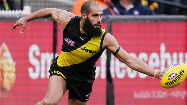 Bachar Houli of the Tigers keeps the ball inside the boundary line