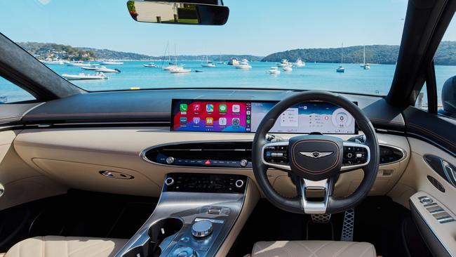 The cockpit of the 2025 Genesis GV70 Signature Sport.